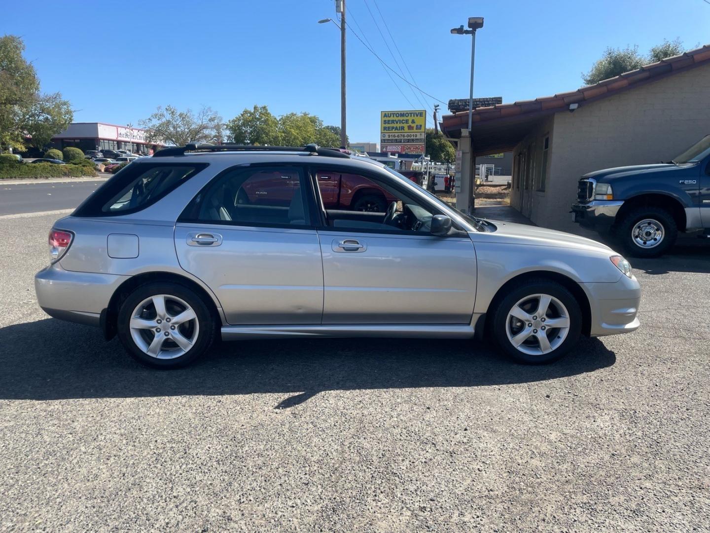 2006 Crystal Gray Metallic Subaru Impreza 2.5 i (JF1GG67626G) with an 2.5L 2L NA H4 single overhead cam (SOHC) 16V Other engine, 5-Speed Manual transmission, located at 800 Riverside Ave, Roseville, CA, 95678, (916) 773-4549, 38.732265, -121.291039 - AWD ONE OWNER CLEAN CARFAX- Photo#5