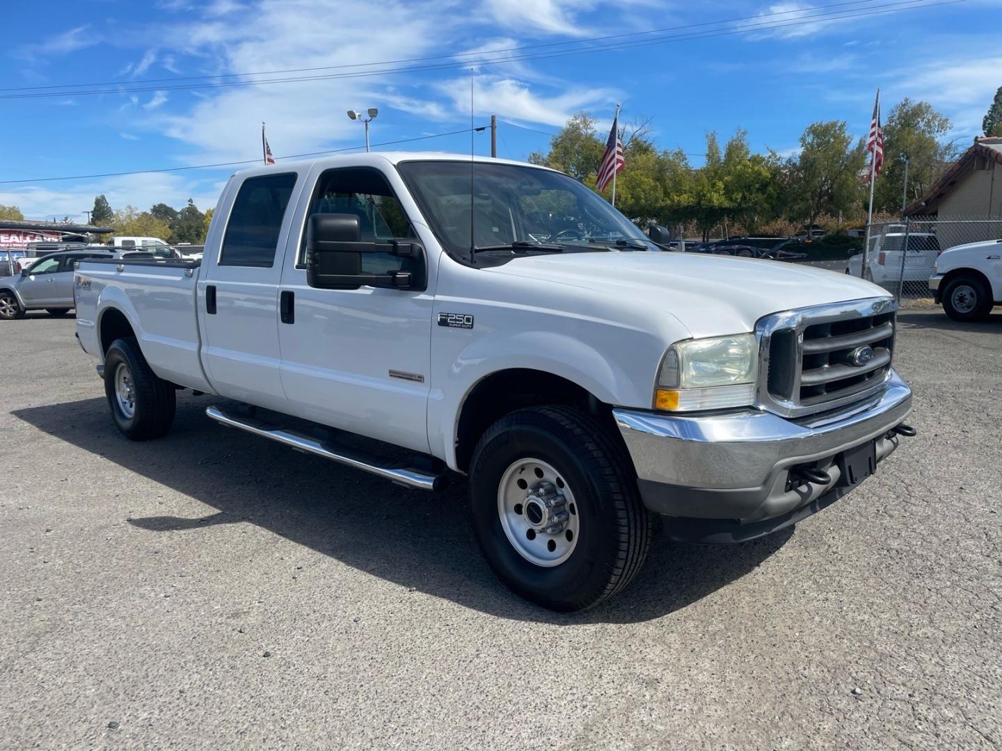2003 Oxford White Ford F-250 Super Duty XLT (1FTNW21P63E) with an Power Stroke 6.0L Diesel Turbo V8 325hp 560ft. lbs. Other engine, 5-Speed Automatic transmission, located at 800 Riverside Ave, Roseville, CA, 95678, (916) 773-4549, 38.732265, -121.291039 - DIESEL CREW CAB 4X4 FX4 XLT SERVICE RECORDS ON CLEAN CARFAX- Photo#1