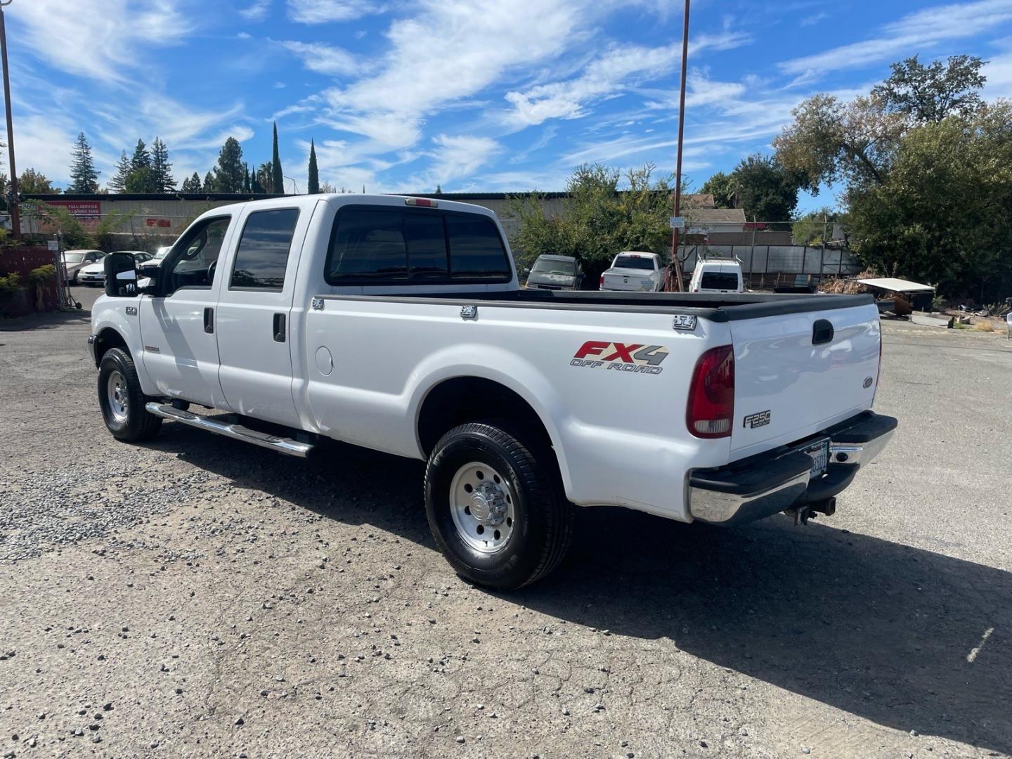2003 Oxford White Ford F-250 Super Duty XLT (1FTNW21P63E) with an Power Stroke 6.0L Diesel Turbo V8 325hp 560ft. lbs. Other engine, 5-Speed Automatic transmission, located at 800 Riverside Ave, Roseville, CA, 95678, (916) 773-4549, 38.732265, -121.291039 - DIESEL CREW CAB 4X4 FX4 XLT SERVICE RECORDS ON CLEAN CARFAX- Photo#2