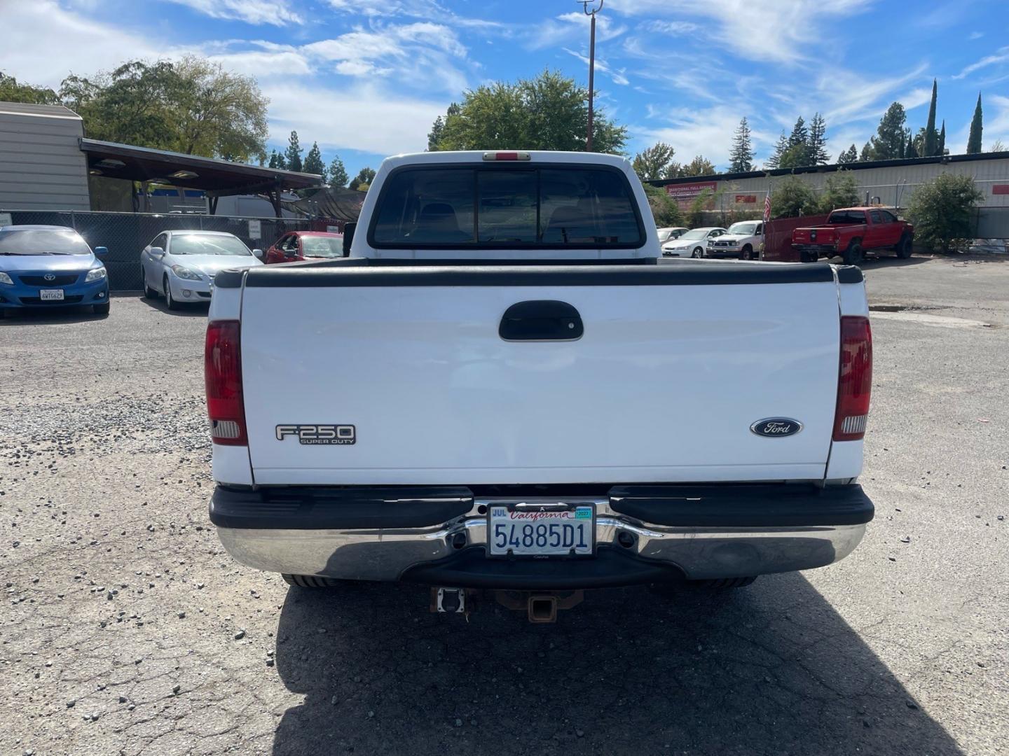 2003 Oxford White Ford F-250 Super Duty XLT (1FTNW21P63E) with an Power Stroke 6.0L Diesel Turbo V8 325hp 560ft. lbs. Other engine, 5-Speed Automatic transmission, located at 800 Riverside Ave, Roseville, CA, 95678, (916) 773-4549, 38.732265, -121.291039 - DIESEL CREW CAB 4X4 FX4 XLT SERVICE RECORDS ON CLEAN CARFAX- Photo#7