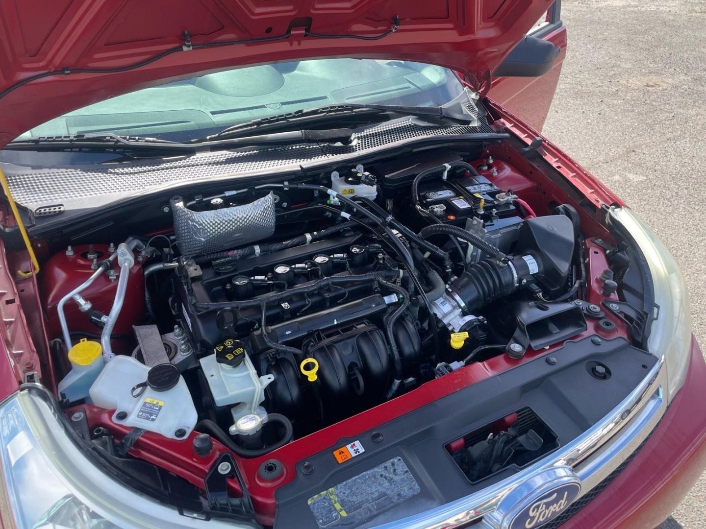 2010 Sangria Red Metallic Ford Focus SE (1FAHP3FN5AW) with an 2.0L 2.0L I4 140hp 136ft. lbs. Sequential Multiport Fuel Injection engine, 4-Speed Automatic transmission, located at 800 Riverside Ave, Roseville, CA, 95678, (916) 773-4549, 38.732265, -121.291039 - SE NEW TIRES CLEAN CARFAX- Photo#13
