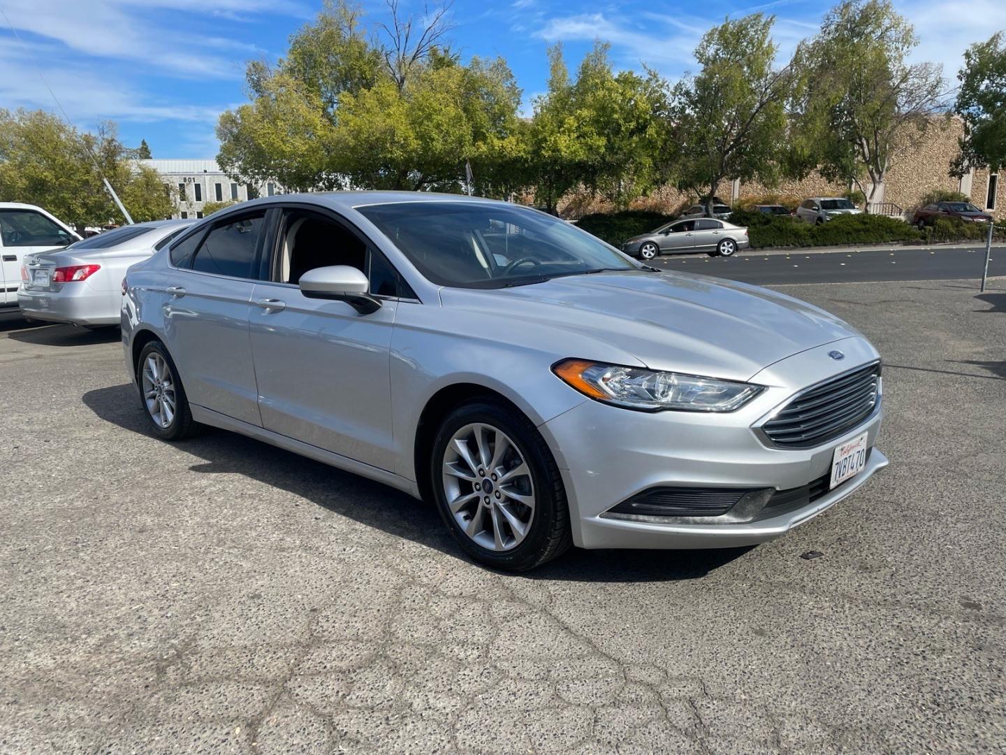 2017 Ingot Silver Ford Fusion SE (3FA6P0H75HR) with an 2.5L 2.5L I4 175hp 175ft. lbs. Sequential Multiport Fuel Injection engine, 6-Speed Automatic transmission, located at 800 Riverside Ave, Roseville, CA, 95678, (916) 773-4549, 38.732265, -121.291039 - SE NEW TIRES- Photo#1