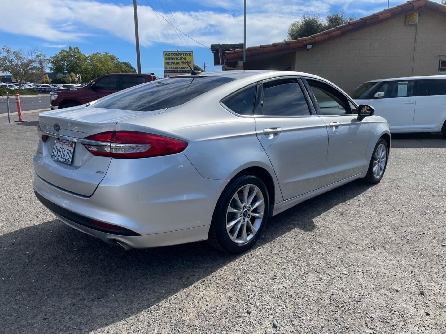 2017 Ingot Silver Ford Fusion SE (3FA6P0H75HR) with an 2.5L 2.5L I4 175hp 175ft. lbs. Sequential Multiport Fuel Injection engine, 6-Speed Automatic transmission, located at 800 Riverside Ave, Roseville, CA, 95678, (916) 773-4549, 38.732265, -121.291039 - SE NEW TIRES- Photo#3