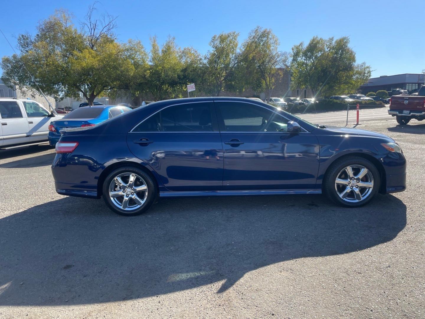 2007 Blue Ribbon Metallic Toyota Camry SE V6 (4T1BK46K17U) with an 3.5L 3.5L V6 268hp 248ft. lbs. Other engine, 6-Speed Shiftable Automatic transmission, located at 800 Riverside Ave, Roseville, CA, 95678, (916) 773-4549, 38.732265, -121.291039 - CLEAN CARFAX- Photo#5