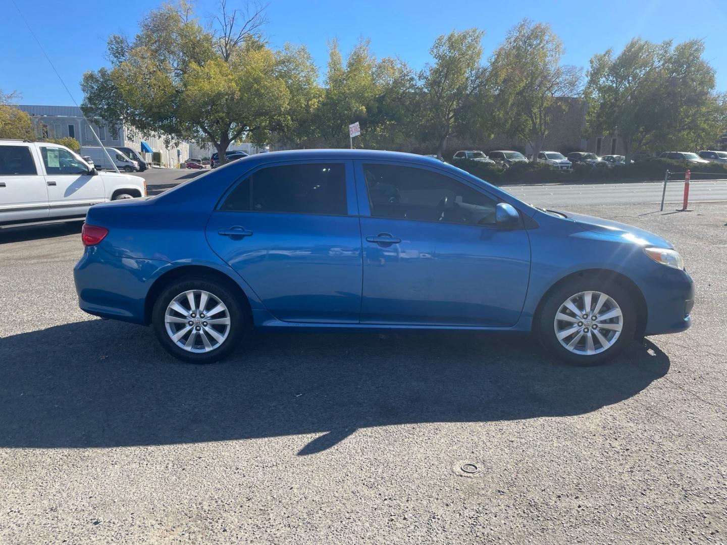 2010 Blue Streak Metallic Toyota Corolla LE (1NXBU4EE5AZ) with an 1.8L 1.8L I4 132hp 128ft. lbs. Sequential Multiport Fuel Injection engine, 4-Speed Automatic transmission, located at 800 Riverside Ave, Roseville, CA, 95678, (916) 773-4549, 38.732265, -121.291039 - CLEAN CARFAX- Photo#5