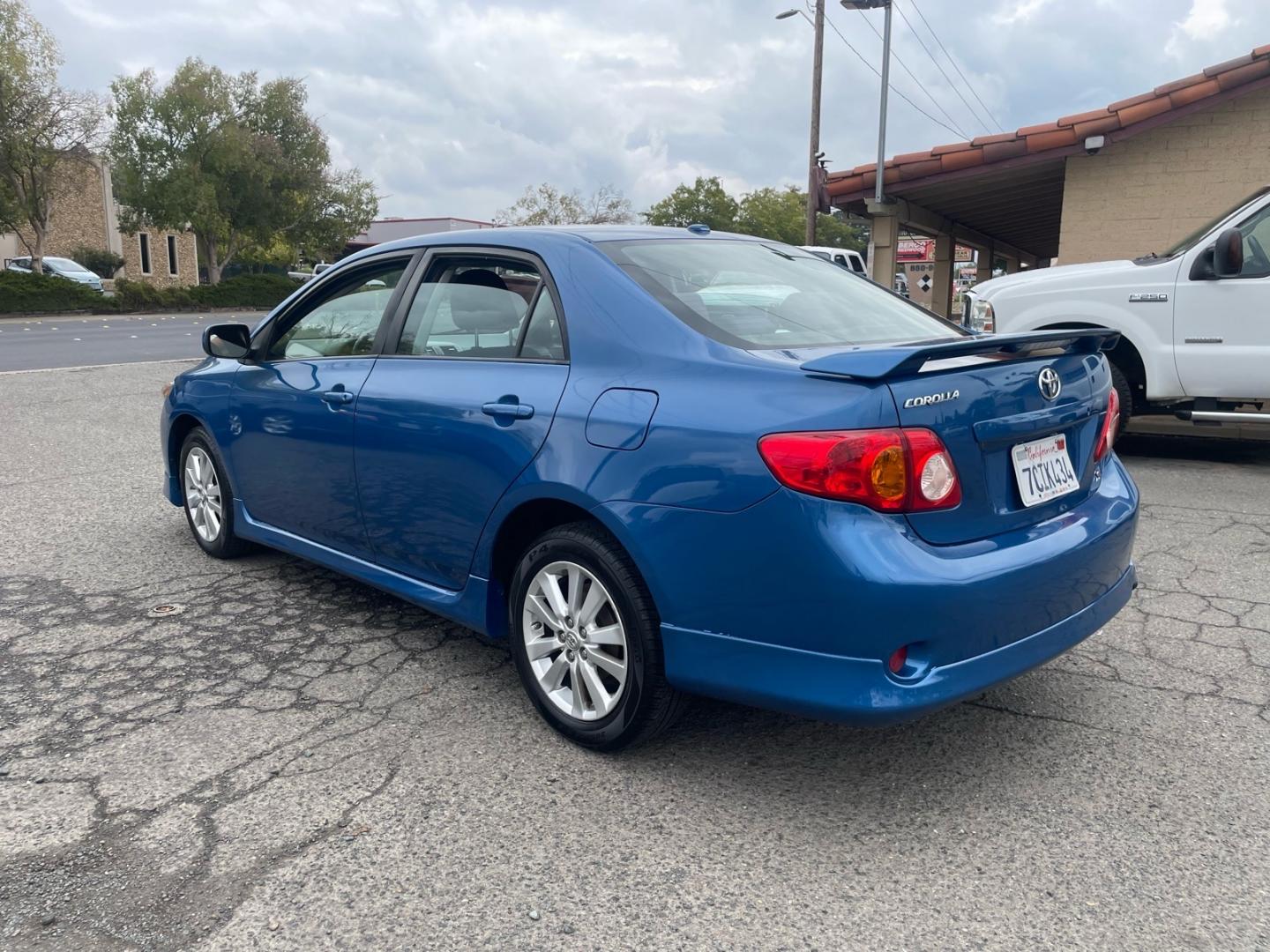 2010 Blue Streak Metallic Toyota Corolla S (1NXBU4EE6AZ) with an 1.8L 1.8L I4 132hp 128ft. lbs. Sequential Multiport Fuel Injection engine, 4-Speed Automatic transmission, located at 800 Riverside Ave, Roseville, CA, 95678, (916) 773-4549, 38.732265, -121.291039- Photo#2