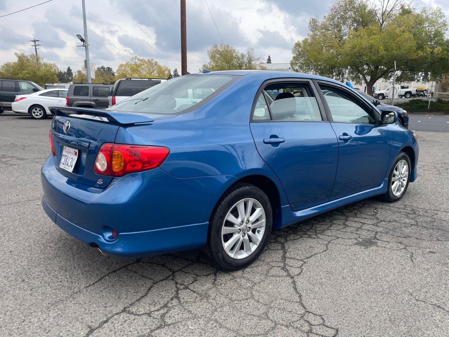 2010 Blue Streak Metallic Toyota Corolla S (1NXBU4EE6AZ) with an 1.8L 1.8L I4 132hp 128ft. lbs. Sequential Multiport Fuel Injection engine, 4-Speed Automatic transmission, located at 800 Riverside Ave, Roseville, CA, 95678, (916) 773-4549, 38.732265, -121.291039- Photo#4
