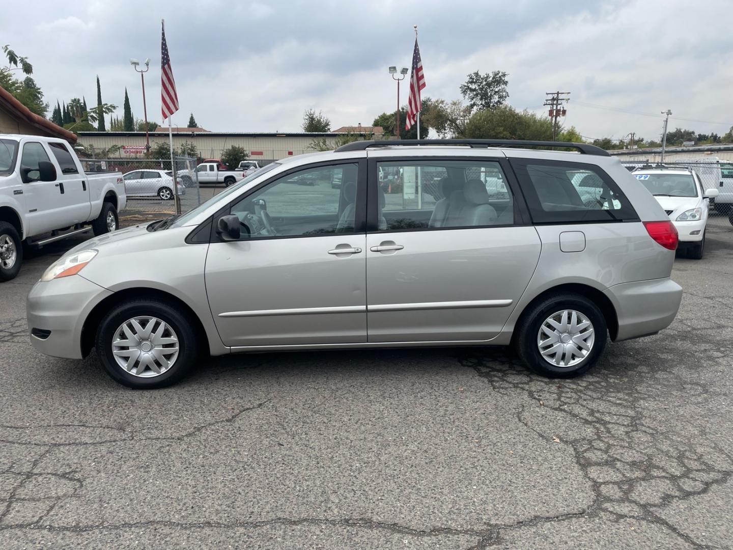 2007 Silver Pine Mica Toyota Sienna CE 8-Passenger (5TDZK23C77S) with an 3.5L 3.5L V6 266hp 245ft. lbs. Sequential Multiport Fuel Injection engine, 5-Speed Automatic transmission, located at 800 Riverside Ave, Roseville, CA, 95678, (916) 773-4549, 38.732265, -121.291039- Photo#1