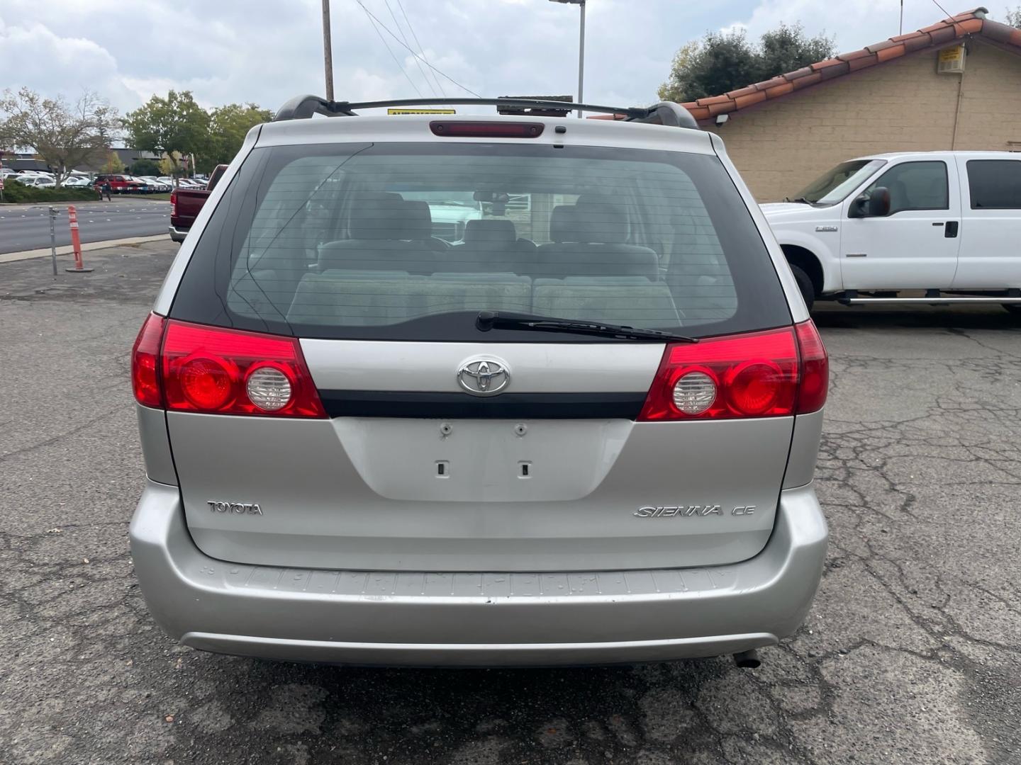 2007 Silver Pine Mica Toyota Sienna CE 8-Passenger (5TDZK23C77S) with an 3.5L 3.5L V6 266hp 245ft. lbs. Sequential Multiport Fuel Injection engine, 5-Speed Automatic transmission, located at 800 Riverside Ave, Roseville, CA, 95678, (916) 773-4549, 38.732265, -121.291039- Photo#3